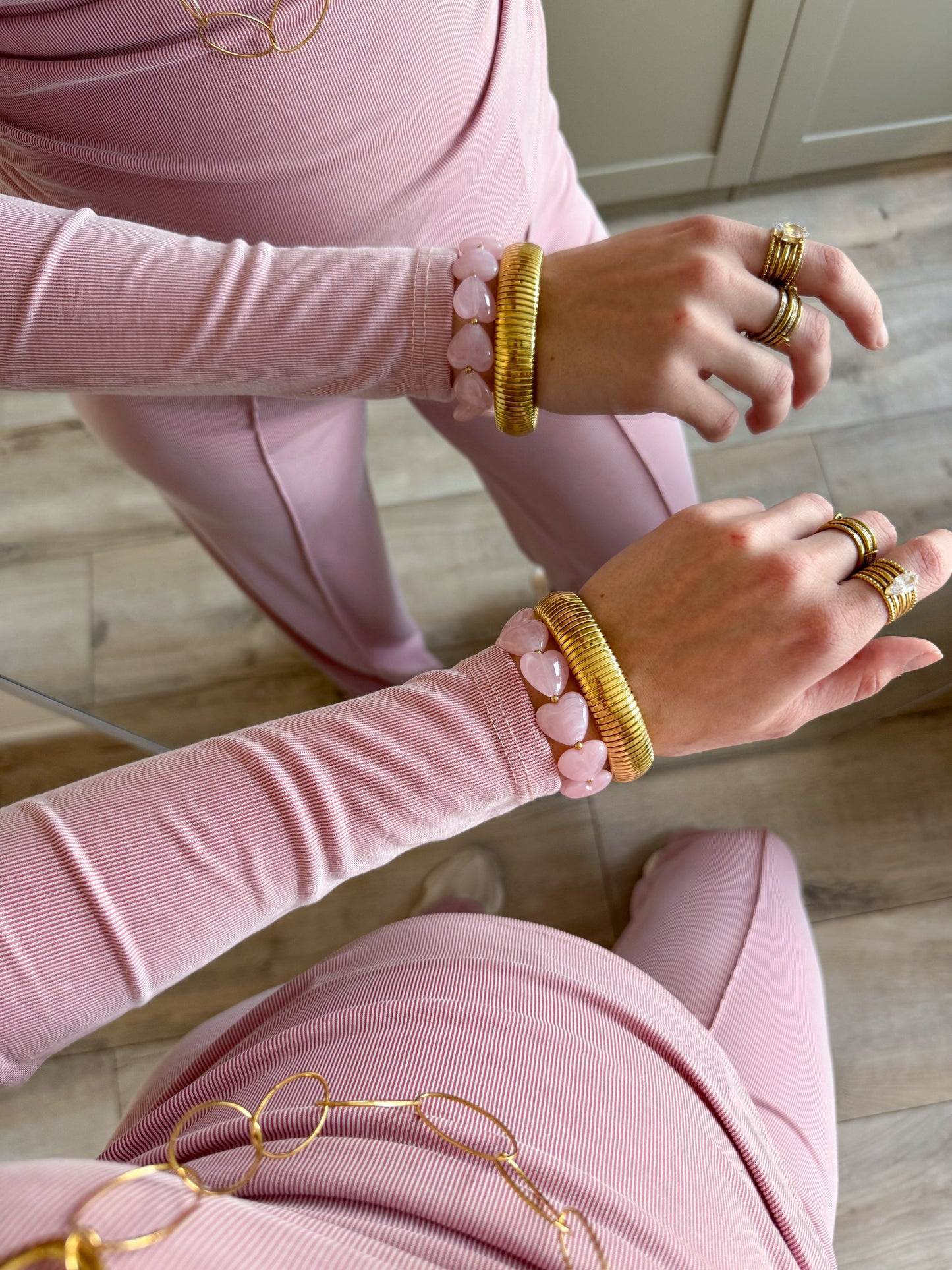 Armband | Kralen hartjes | Lichtroze goud