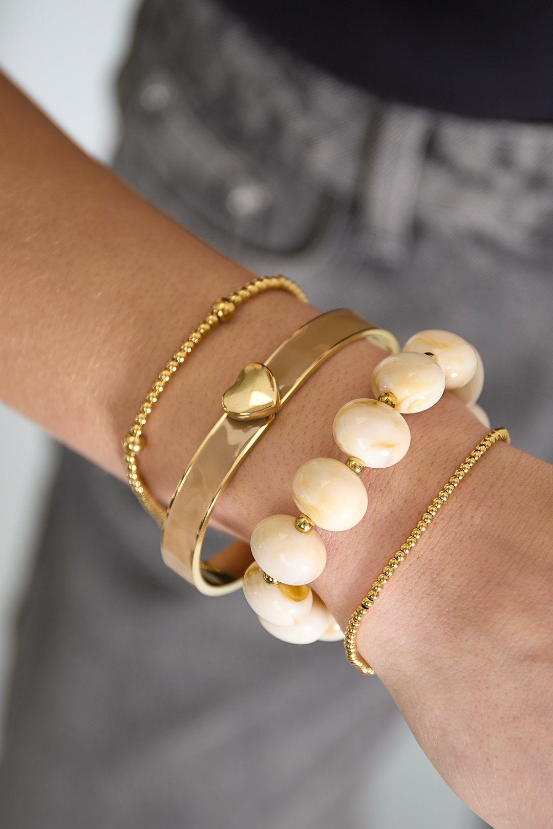 Armband | Kralen rond | Beige goud